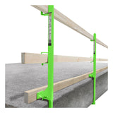 The Frontline Concrete Slab Grabber GUC2X4 by Frontline Fall Protection mounts to slab edges, using horizontal wooden rails for secure perimeter edge protection.