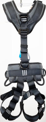 A French Creek Production safety harness, model French Creek Navigator w/Aluminum Waist D-Ring 22030BHAP-BLK, in black and gray features adjustable straps, metal buckles, and air-mesh padding. This full body harness includes loops and clip areas for securing equipment, all displayed on a transparent display hook.