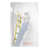 A person wearing a safety helmet and harness, equipped with carabiners, climbs a yellow French Creek Production WL Flexible Access Ladder indoors. Designed for confined spaces and rescue operations, this ladder features fiberglass rungs. The background is a light industrial setting with white walls.