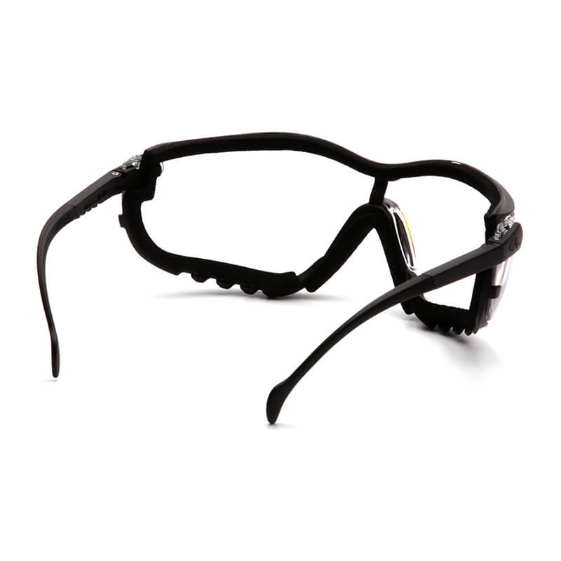 A pair of Pyramex Safety V2G Goggles GB18_0ST (12/box) sports safety glasses with wraparound arms and foam padding inside the frame, shown from a rear angle.