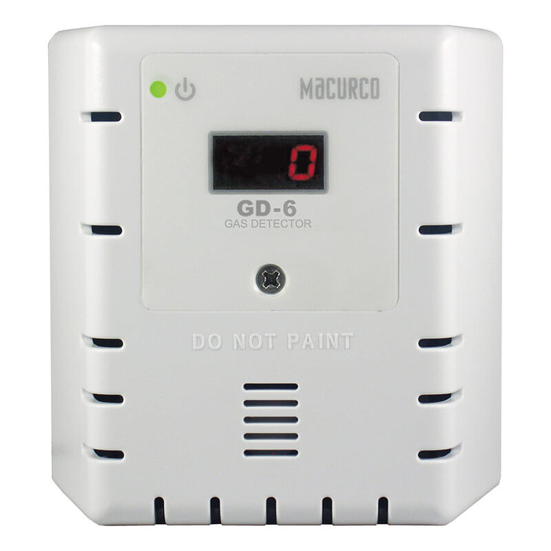 mounted safety device for combustible gas detection. It features a digital display showing "0," ventilation slots, a small green indicator light, and is marked with the text "GD-6 Gas Detector" alongside instructions stating "Do Not Paint." An essential piece of safety equipment from the Macurco brand.