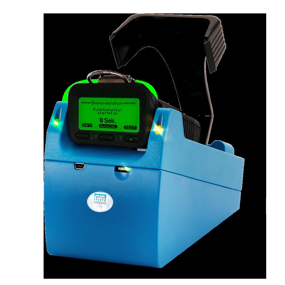 The GfG TS400 Test Station for G450/G460 with Charging is a blue electronic device equipped with a digital screen that displays text in German and features a large black antenna. This measuring instrument includes advanced sensor diagnostics, prominently showcasing the GfG brand logo.