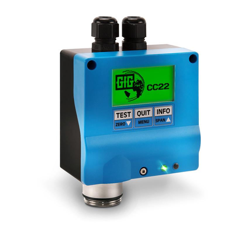 A blue GfG CC22 CH4 Fixed Transmitter CC22-701_ with two black connectors on top features a green digital display. The screen shows "GfG CC22" with navigation buttons labeled Test, Quit, Menu, and Info. A green light at the bottom indicates catalytic combustion status.