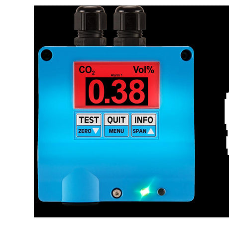 The GfG IR22 CO2 Fixed Transmitter IRR22-804, featuring a blue casing, is equipped with an infrared gas sensor and a red screen displaying 0.38. Its front panel includes buttons labeled TEST, QUIT, MENU, INFO, ZERO, and SPAN, along with an indicator light in the bottom right corner for optimal carbon dioxide detection.