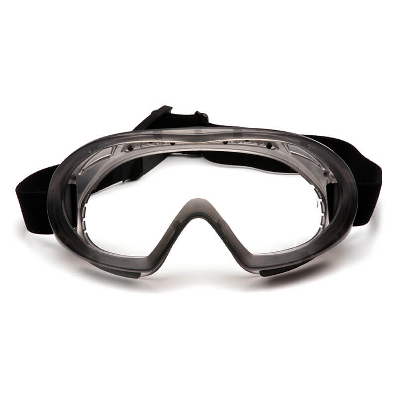 Pyramex Safety Capstone Anti-Fog Safety Goggles GG504T (12 pairs) feature impact protection, a wide transparent lens, black adjustable strap, and flexible frame to shield eyes from debris and hazardous materials.