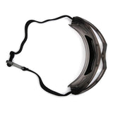 The Pyramex Capstone Anti-Fog Safety Goggles GG504T by Pyramex Safety provide impact protection and pair well with a transparent plastic face shield with an adjustable black strap for enhanced personal protective coverage.