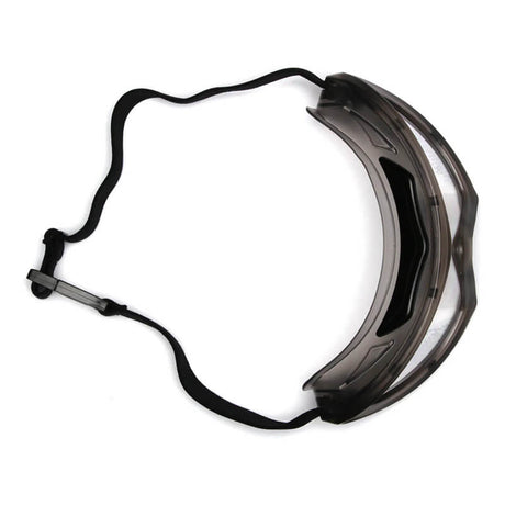 The Pyramex Capstone Anti-Fog Safety Goggles GG504T by Pyramex Safety provide impact protection and pair well with a transparent plastic face shield with an adjustable black strap for enhanced personal protective coverage.