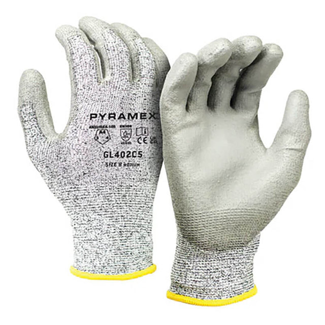 The Pyramex Safety Poly-Torq Cut Resistant Gloves GL402C5, available in a pack of 12 pairs, feature textured palms for excellent gripping power. With yellow cuffs and detailed text and logo showcasing their specifications and certifications, these gray gloves have a durable polyurethane-coated finish that enhances their performance as cut-resistant gloves.