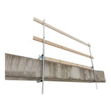 The French Creek Portable Guardrail System GR200 by French Creek Production, featuring a concrete parapet wall with metal clamps and wooden railings, is designed to enhance safety on construction sites. This essential fall prevention system stands isolated against a white background.