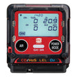 The PK Safety RKI GX-3R with Pump Bundle is a portable multi-gas monitor displaying CH₄, O₂, CO, and H₂S readings, featuring "AIR" and "POWER MODE" buttons and clear indicators—ideal for confined space detection.