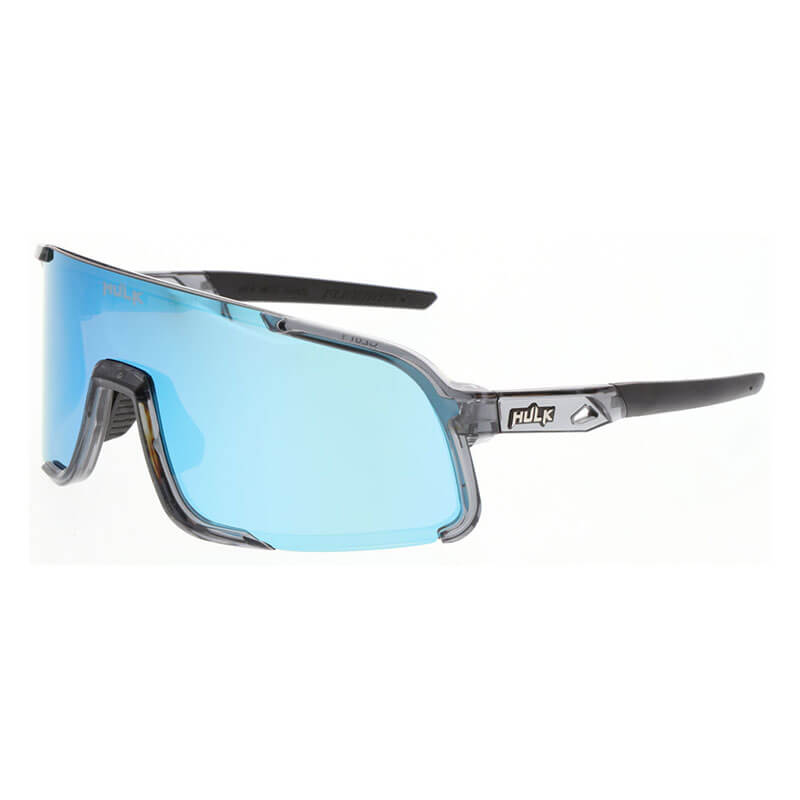 The MCR Safety Hulk HK4 Mirror Lens MAX3 Safety Glasses feature a black and gray wraparound frame, blue-tinted scratch-resistant lens, and “Huk” branding—ideal for outdoor activities. Sold as a box of 12.
