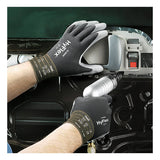 Wearing Ansell HyFlex Polyurethane Coated Glove 11-600 by Ansell, which features a durable polyurethane coating and a comfortable nylon knit liner, an individual uses a power tool to assemble or repair the interior panel of a car door.