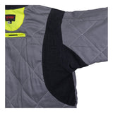Close-up of a gray, quilted racing suit with black textured fabric on the underarm and side panels, featuring a neon yellow lining at the collar similar to the NSA DRIFIRE FR Hi-Vis Insulated Jacket JKT-01C3-HV.