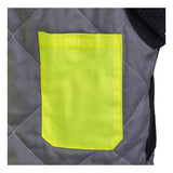 A close-up of quilted gray fabric displays a bright yellow square pocket with visible stitching, highlighting the detailed craftsmanship of the NSA DRIFIRE FR Hi-Vis Insulated Jacket JKT-01C3-HV.