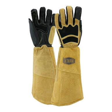 Introducing the PIP Ironcat Premium Goatskin/Cowhide Climax Welder's Gloves by Protective Industrial Products. These heavy-duty gloves offer long, protective cuffs and feature black fingers and palms. The tan leather extends up the forearm, while Kevlar stitching enhances durability and protection, making them ideal for both welding and gardening tasks.