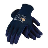 A pair of PIP MaxiFlex Elite Ultra Lightweight Work Gloves in navy blue, featuring a micro-foam nitrile coating for abrasion resistance. The textured palms and fingers improve grip, and the gloves display printed safety certifications on the back of one glove when overlapped.