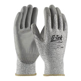 The PIP G-Tek PolyKor Industry Grade Gloves (16-533) by Protective Industrial Products boast a speckled grey texture, with the logo and safety symbols on one glove. Designed for a snug fit, these gloves offer excellent cut resistance and durability, complemented by a polyurethane-coated flat grip for superior performance.