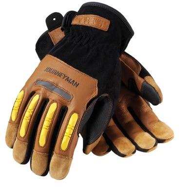 A pair of PIP Maximum Safety Journeyman Gloves 120-4200 features black fabric with brown reinforced goatskin leather sections and yellow TPR knuckle guards for added protection, with "JOURNEYMAN" printed on the back of one glove.