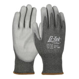 The PIP G-Tek PolyKor Glove with PU Coated Flat Grip (16-573) from Protective Industrial Products features a textured grip and a knit wrist cuff for a secure fit. These gray and white gloves are touchscreen-compatible and offer impressive cut resistance, ensuring both safety and convenience on the job.