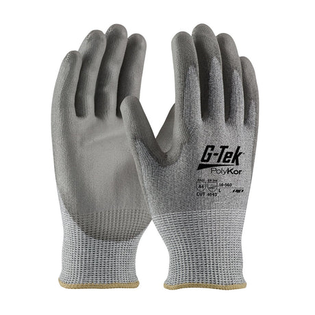 A set of PIP G-Tek PolyKor safety gloves, displaying both front and back views. These gloves feature textured, polyurethane-coated palms and fingers for enhanced grip. They are clearly marked with safety and product information, providing excellent cut resistance.