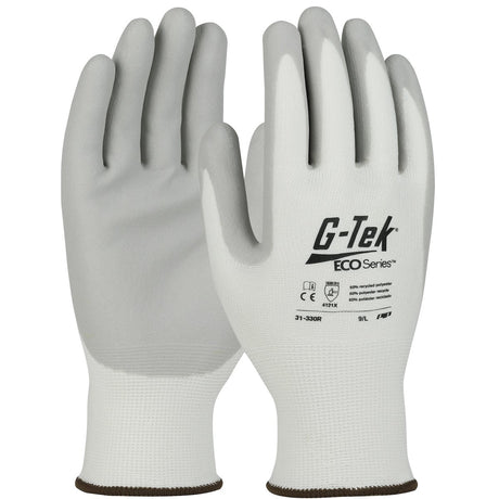 Twelve pairs of PIP's G-Tek ECO Yarn/Spandex Foam Grip Gloves (model 31-330R) are showcased, upright, with branding and text visible on their backs. Crafted from recycled yarn, these eco-conscious gloves include a ribbed cuff and a textured grip area, making them perfect for protective or industrial applications.