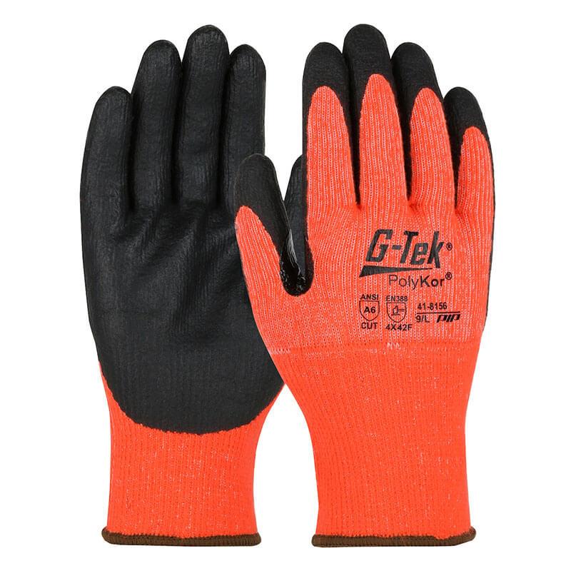 A pair of bright orange work gloves is shown, featuring black rubber-coated palms. The text and symbols on the back reveal that they are PIP G-Tek PolyKor/Acrylic Blend Gloves, crafted by Protective Industrial Products (PIP) for protection. They come with a nitrile foam grip to enhance handling.