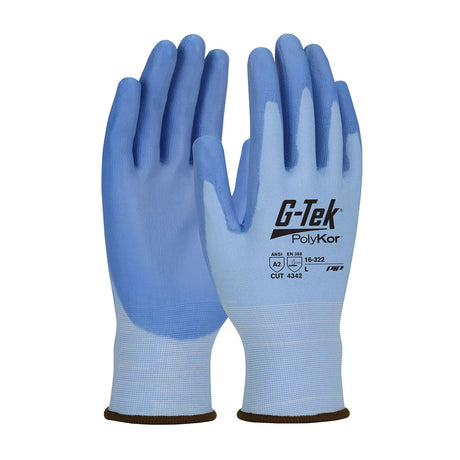 A pair of PIP G-Tek PolyKor gloves in light blue, featuring polyurethane-coated dark blue palms and fingers, with markings on the back indicating cut resistance levels. These gloves from Protective Industrial Products ensure high dexterity handling with black trim at the cuffs for enhanced safety and precision.