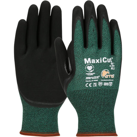 A set of green and black PIP MaxiCut Oil Seamless Knit Gloves (Model 44-304), available in packs of 12 pairs, features nitrile-coated surfaces for enhanced grip. These cut-resistant gloves are equipped with safety certifications and size details printed on them, ensuring durability while providing breathable comfort.