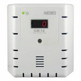 The Macurco CO Fixed Gas Detector Controller Transducer, in white, features a digital display showing "0" and is designed for carbon monoxide detection in commercial environments. It includes vents on the sides and top, along with a small light indicator. Clearly labeled with "DO NOT PAINT," it prioritizes safety and functionality.