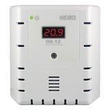 A Macurco O2 Fixed Gas Detector Controller Transducer, in white, features a digital display reading "20.9." Designed as a fixed gas detector, it includes ventilation slits and bears the warning "DO NOT PAINT" on its surface.