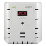 A Macurco O2 Fixed Gas Detector Controller Transducer, marked with the words "DO NOT PAINT," displays "20.9" on its small digital screen and features ventilation slots.