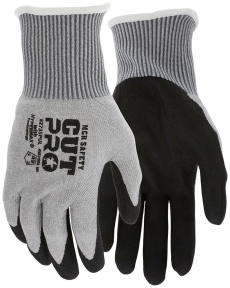 A pair of gray and black MCR Cut Pro 13G HyperMax PU Coated Gloves 9273SPU from MCR Safety, designed with ribbed cuffs for increased durability. These ANSI cut level A9 gloves feature text and symbols that highlight their superior protection capabilities.