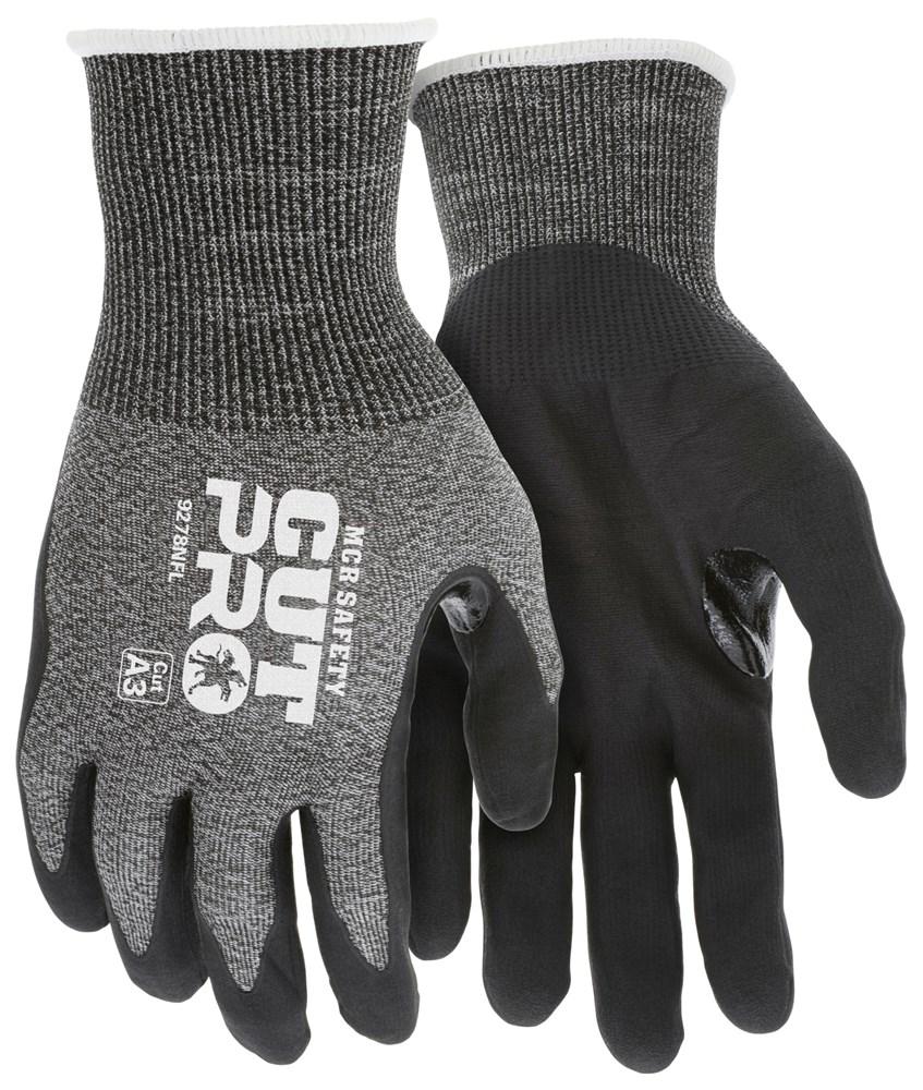 The MCR Safety Cut Pro 18 Ga HyperMax Nitrile Foam Gloves 9278NF, from MCR Safety, are a pair of black and gray cut protection gloves with textured grips and a robust HyperMax shell. Featuring "CUT PRO" and safety ratings printed on the back, these gloves come with nitrile foam coating and elastic cuffs, making them ideal for tasks that require superior cut resistance.