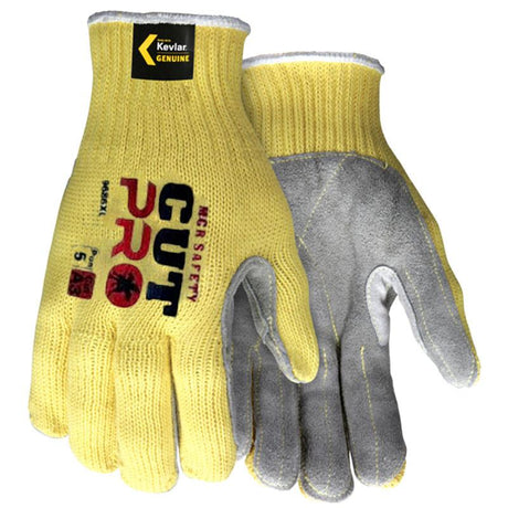 A pair of MCR Memphis Grip Sharp Kevlar/Leather Palm Gloves (9686) in yellow, featuring gray palms and fingertips along with the "MCR Safety" branding in red and black, is designed for optimal cut protection, ensuring both durability and safety.