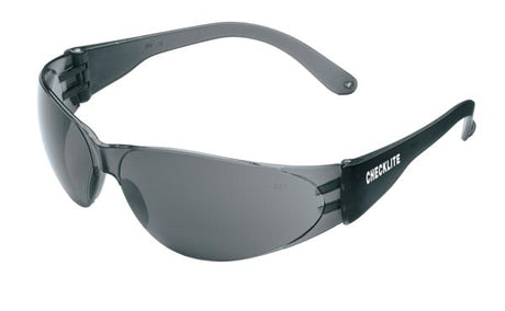 A pair of stylish black MCR Checklite safety glasses with wraparound frames offering UV protection and tinted, scratch-resistant lenses. The frame is marked with "Checklite" on the side. Their design boasts curved arms and a contemporary appearance, perfectly integrating protection with style.