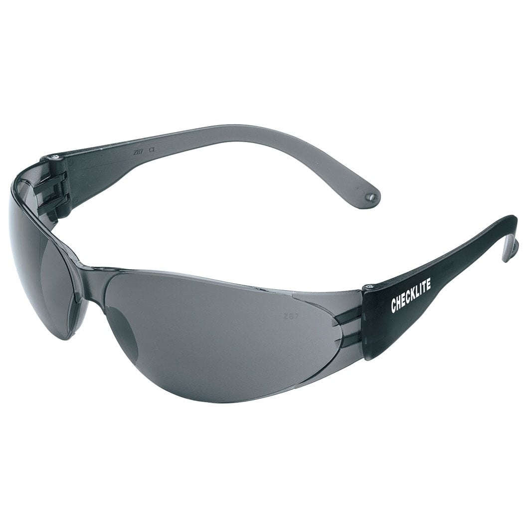 A pair of gray MCR Checklite Anti-Fog Safety Glasses CL11, branded with "MCR Safety" on the temples. These glasses boast a sleek, wraparound design with black frames and dark tinted lenses that have a scratch-resistant coating for enhanced durability.