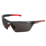 The MCR Safety Dominator DM3 Gun Metal Frame Glasses DM131 feature a sleek wraparound design with black sports styling and dark lenses, complemented by red accents on the arms for added flair. They are equipped with an adjustable nose pad for enhanced comfort and bear the distinctive "MCR Safety" logo on the side of the frame. These glasses come with a scratch-resistant coating, making them ideal safety eyewear for outdoor activities.