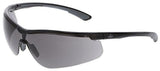 Introducing the MCR Klondike KD7 Safety Glasses by MCR Safety, featuring a sleek design with black wraparound frames. These glasses include dark tinted MAX6 AF lenses, UV protection, integrated nose pads, and curved temples for a minimalist aesthetic and secure fit, available in boxes of 12.