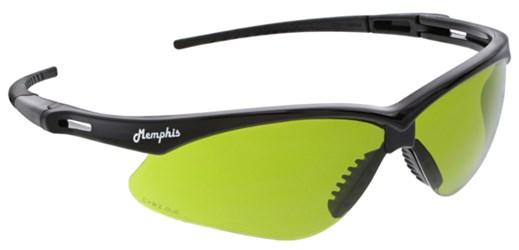 A pair of MCR Memphis Black Welding Safety Glasses MP11_0, featuring durable polycarbonate lenses with black frames and yellow-tinted shades. The word "Memphis" is stylishly inscribed on the side, ensuring both flair and function.