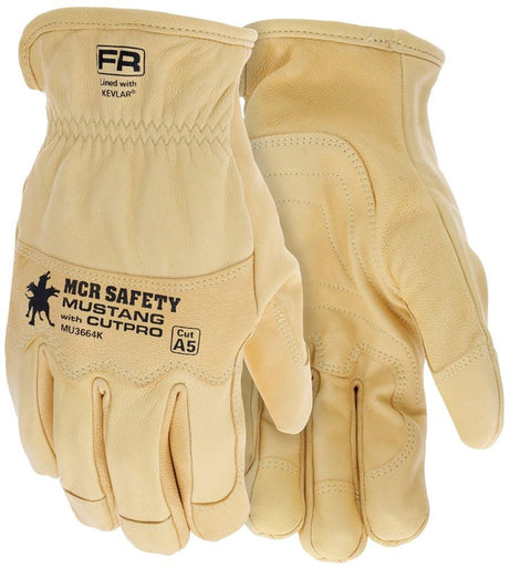 Displayed is a pair of MCR Safety MCR Mustang HiDex Kevlar Lined Leather Driver gloves in light brown, crafted from durable goatskin leather with reinforced palms. The text on the gloves reads "FR Mustang Cutpro with Kevlar" and "Cut A5." These gloves are designed for high dexterity and include an elastic band at the wrist for a secure fit.