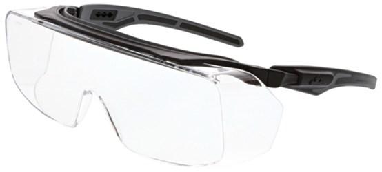 The MCR Safety Klondike OTG Safety Glasses, featuring the MAX6 Anti-Fog Lens (OG21_PF), come in a box of 12 and are designed with oversized wraparound frames and black adjustable temples against a white background. The clear lenses offer excellent eye protection while maintaining visibility, meeting the ANSI Z87+ safety standard.