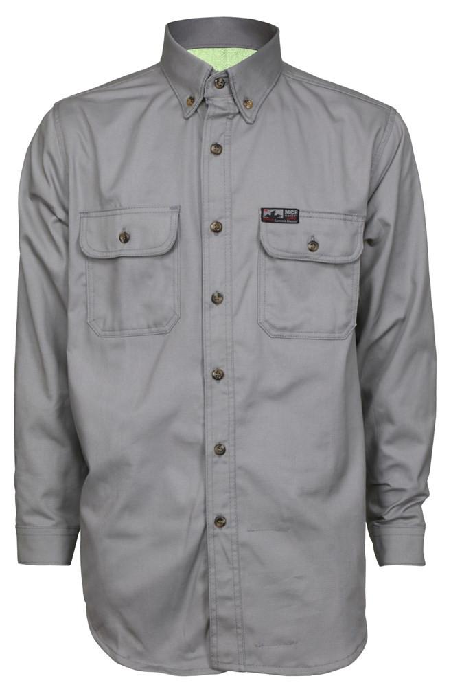 This MCR Safety Summit Breeze 7 oz FR Shirt SBS200_ is a long-sleeved, grey button-up featuring a collar and two chest pockets with button closures. A small label decorates the right pocket, adding to its appeal. Ideal for safety, this flame-resistant clothing piece is elegantly displayed on a white background.