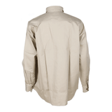 The ForgeFR Forge FR Solid Button Shirt MFRLB2PS024, crafted from FRARCTEX FR fabric in beige, is displayed from the back. It includes a collar and buttoned cuffs, has a loose fit with a minimalistic design, and offers an additional layer of safety with an ATPV arc rating of 8.8 cal/cm2.