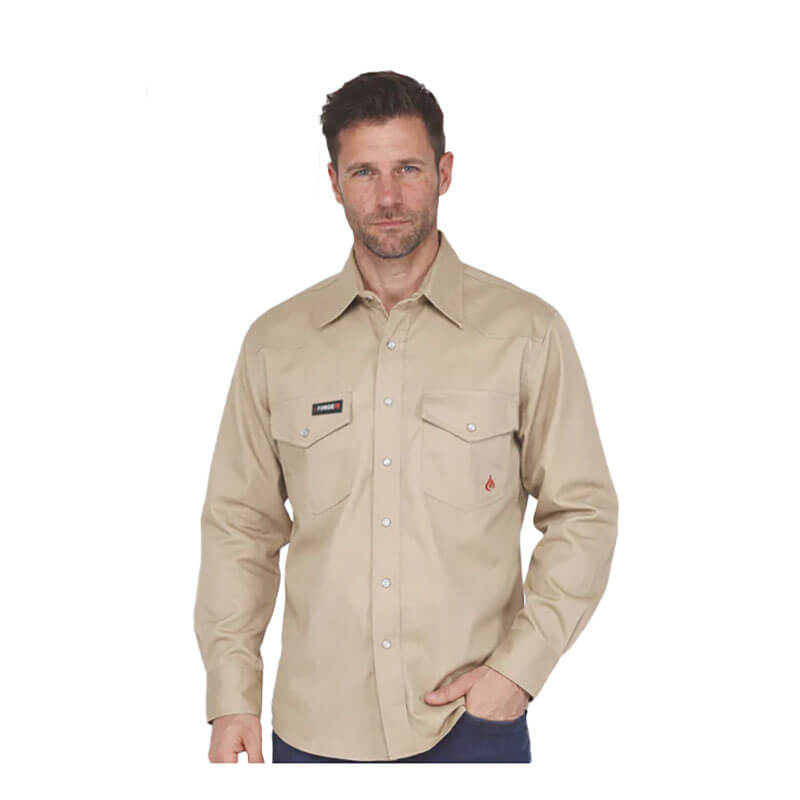A man with short brown hair and a beard wears a beige ForgeFR Forge FR Solid Shirt MFRSLD-002 with two chest pockets, standing against a plain white background.