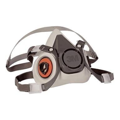 The 3M 6000 Series Half Facepiece Respirator is a gray and black mask featuring adjustable straps and a round valve on one side. This NIOSH-approved product by 3M is designed for air filtration, making it an essential choice for protecting against dust and fumes in industrial or construction environments.