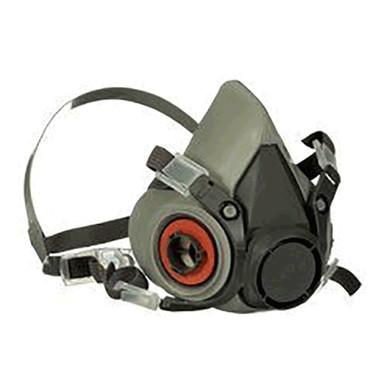 Introducing the 3M 6000 Series Half Facepiece Respirator: a NIOSH-approved gray mask from 3M, featuring adjustable black straps and equipped with dual filter cartridges on each side.