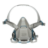 Introducing the 3M Half Facepiece Reusable Respirator 6500 Series, a gray and blue mask that offers respiratory protection by covering the nose and mouth. It features adjustable straps for a secure fit, a central front exhalation valve, and compatibility with 3M cartridges.