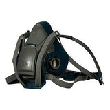 The 3M 6500QL Quick-Release Half Face Respirator Mask is a black and gray respirator mask designed for respiratory protection. This NIOSH-approved product from 3M features adjustable straps, a sturdy front, vent openings on the sides, and a convenient quick-release feature for easy removal.