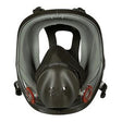 Front view of 3M's 6000 Series Full Facepiece Respirator, showcasing a black full-face mask with an expansive clear visor and two round red filters on either side. It features adjustable straps and a prominent design that covers the nose and mouth area.