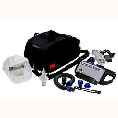 The 3M Versaflo Healthcare PAPR Kit TR-600-HK by 3M includes a protective equipment set with a black carrying bag and a white respirator hood, paired with an air filter unit featuring a control panel for powered air respirator use. The kit also contains a power adapter, tubes, and various connectors, making it ideal for protection against particulates. All items are displayed on a white background.